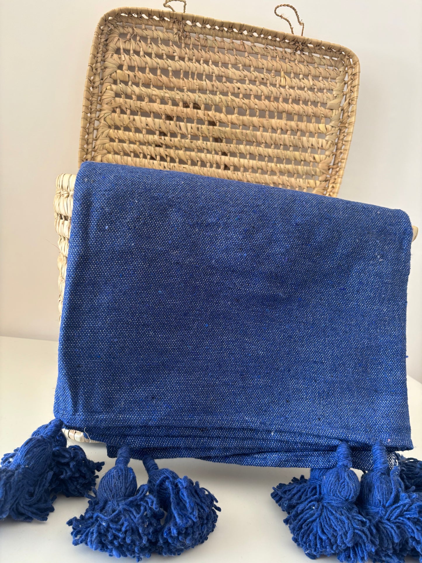 PLAID A POMPOM COULEUR UNI