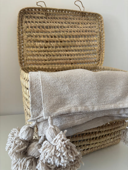 PLAID A POMPOM COULEUR UNI