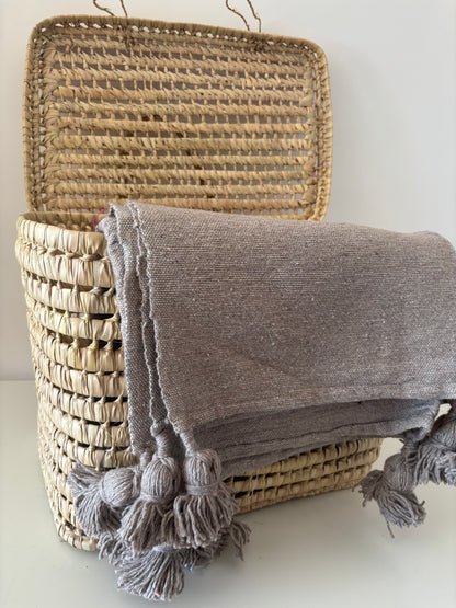 PLAID A POMPOM COULEUR UNI