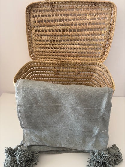 PLAID A RAYURE ET POMPOM