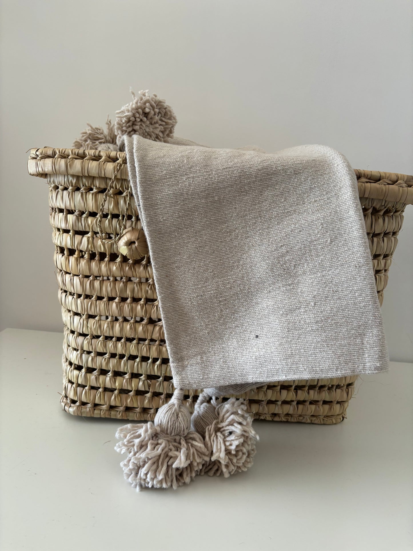 HOUSSE DE COUSSIN A POMPOM UNI